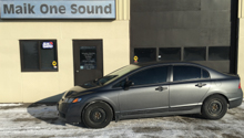 Grey 2012 Honda Civic with professional window tint in North Bay